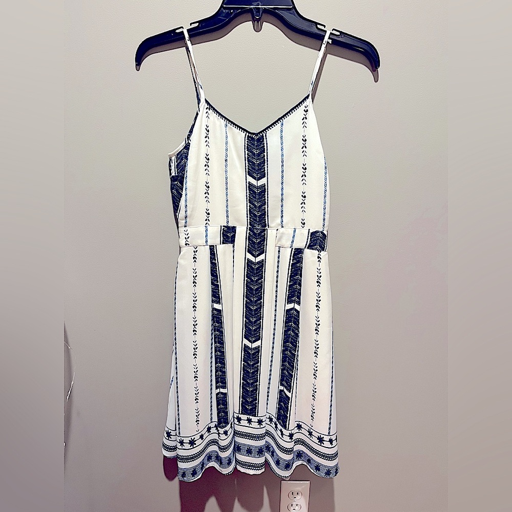 This Aqua dress is lightweight and perfect for vacation, day or night events.